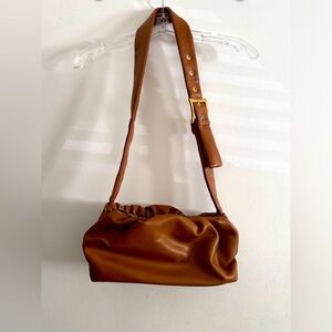 caramel brown barrel bag